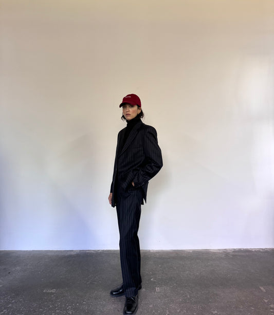 Deep blue pinstriped suit