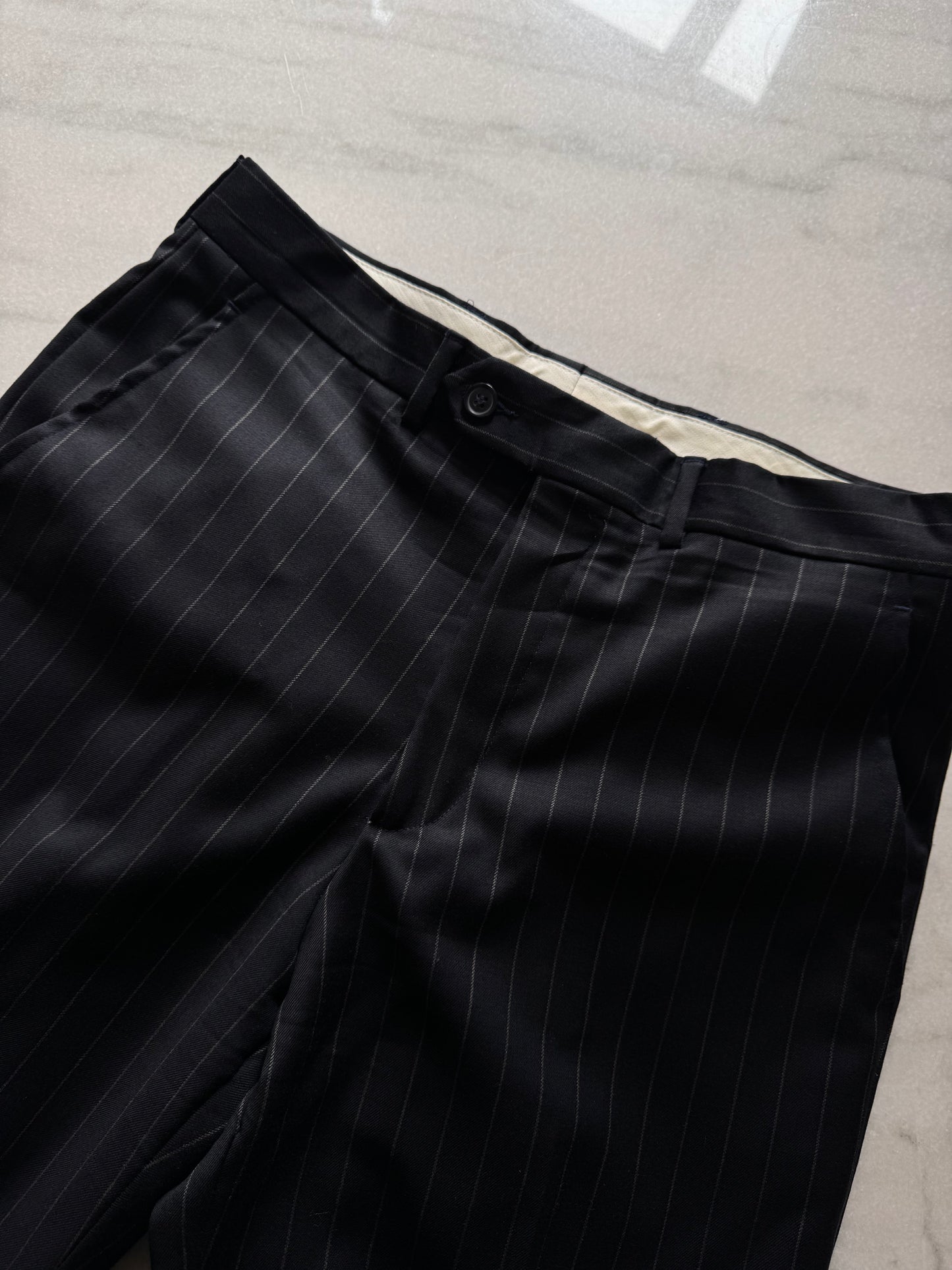 Deep blue pinstriped suit