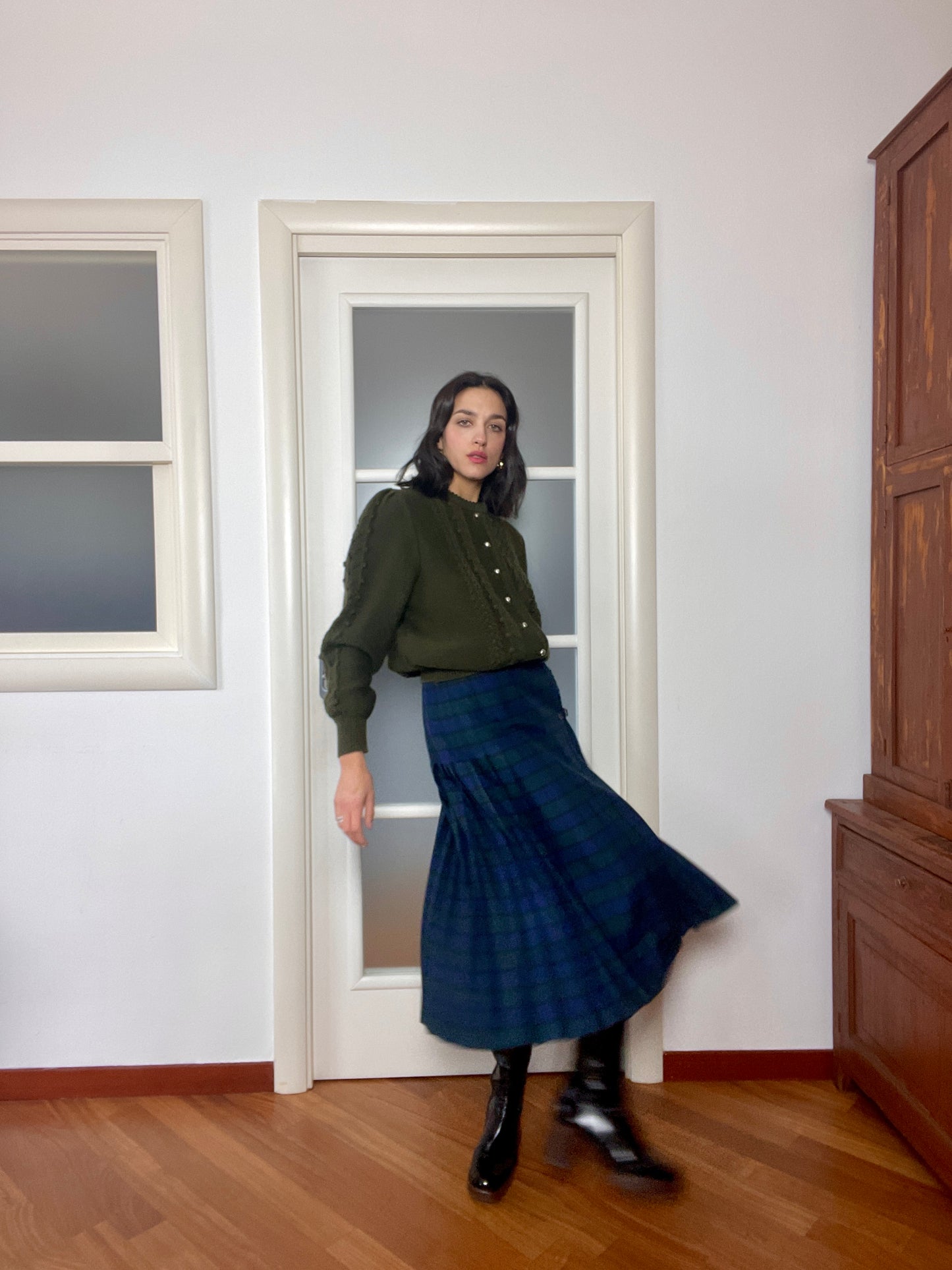 The pleated tartan skirt