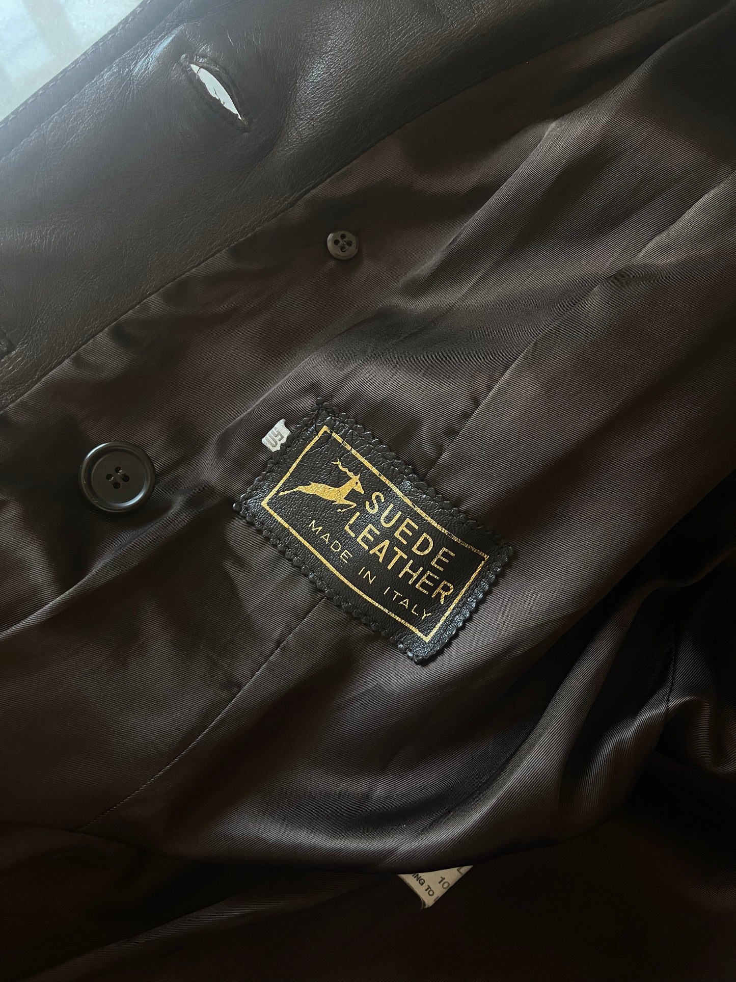 The brownie leather trench