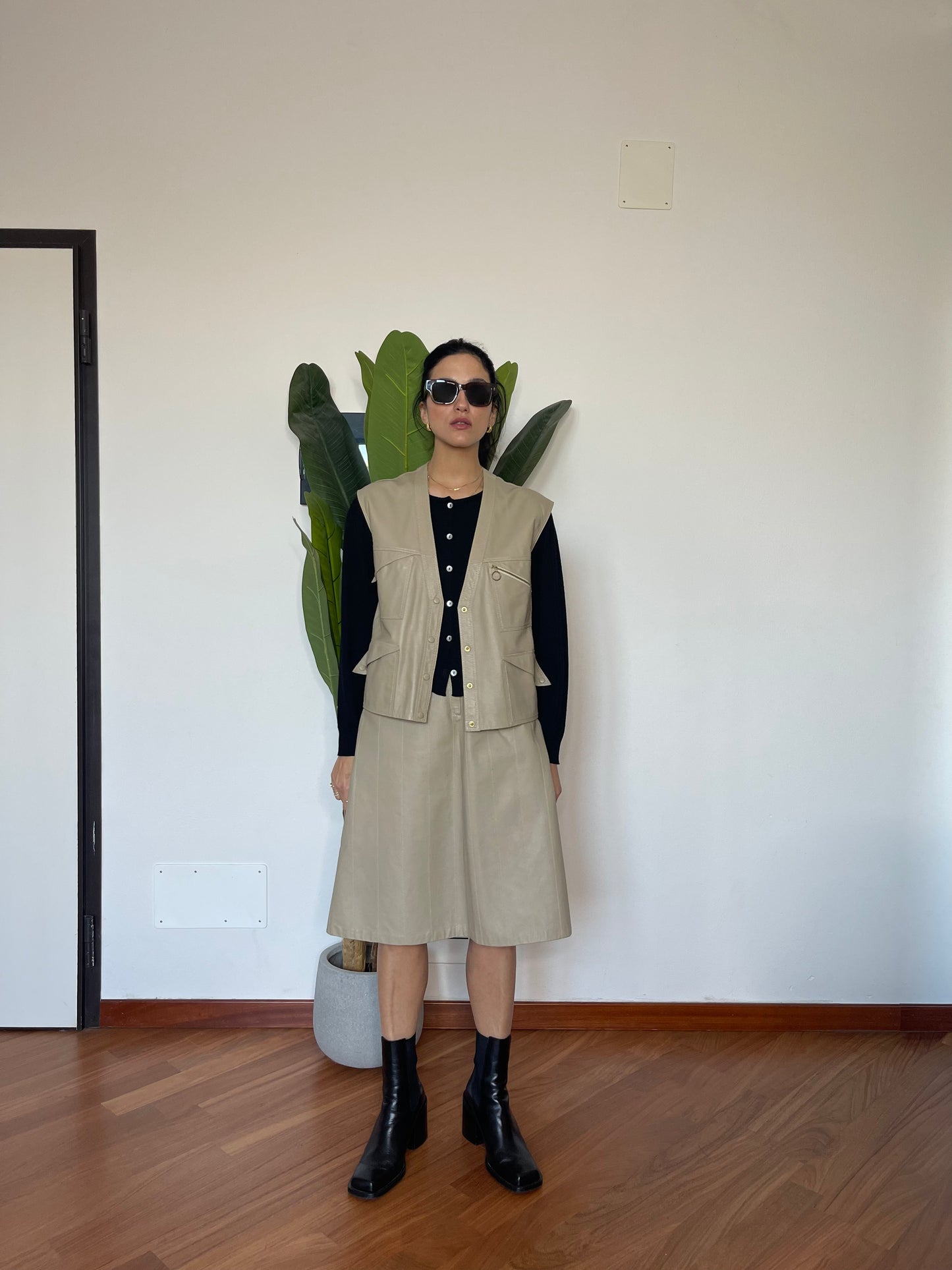 The leather sand vest & skirt