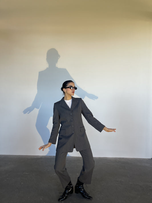 The 90s grey suit