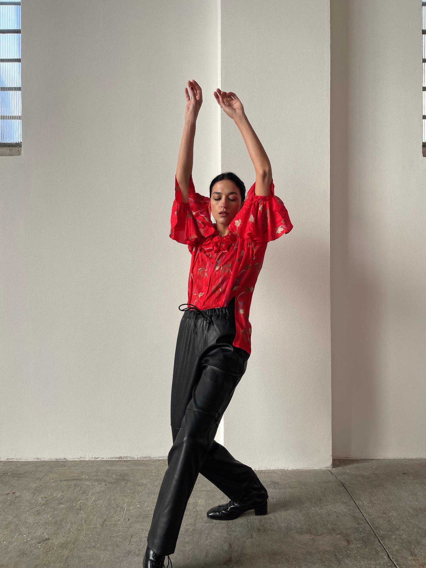 Red floral silk blouse