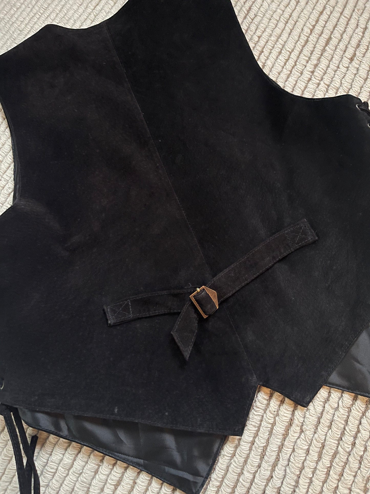 The black leather vest perfetto imperfetto
